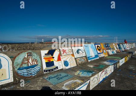 Painted marina wall in Horta with view on Pico, Faial, Acores, Portugal Stock Photo