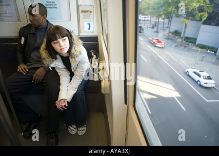 People riding a train Stock Photo