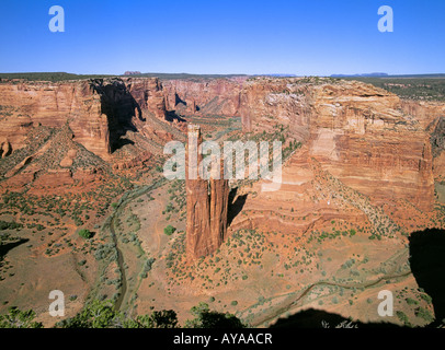 A view of the eroded riverbed and sandstone canyon walls of Canyon de Chelly Stock Photo