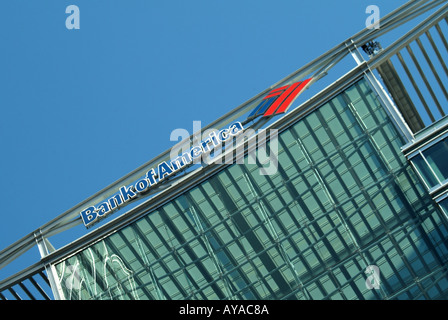 London Docklands Bank of America building adjacent to Canada Tower with logo at roof level Stock Photo