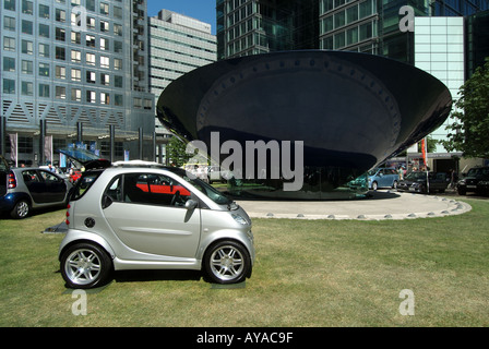 London Canary Wharf Motor Expo car motor show organised by Daily Telegraph Daimler Chrysler Smart car Canada Tower beyond Stock Photo