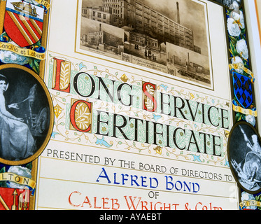 A photo of a long service certificate awarded in 1929 to an employee for working 40 years for the same company.