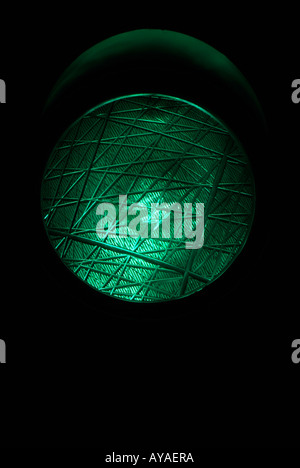 Go Light at Night Traffic Light Displaying the Green Signal Stock Photo