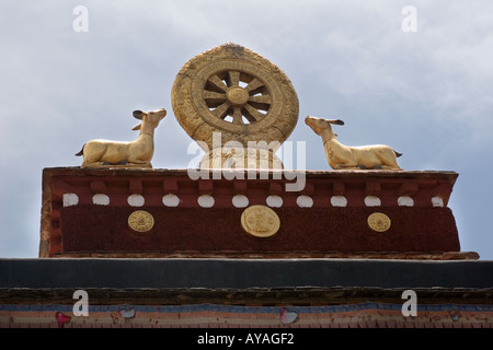 Famous gold dharma symbols on top of the Jokhang Temple in Lhasa Tibet Stock Photo