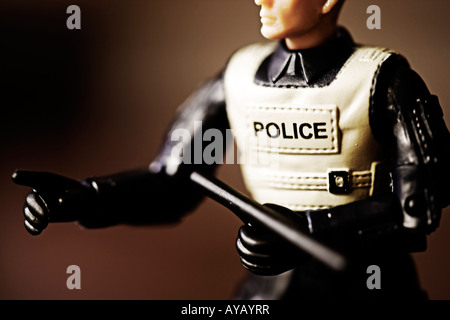 Toy Police figure made of plastic Close up Stock Photo