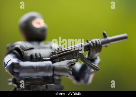 Toy Police figure made of plastic Close up Stock Photo