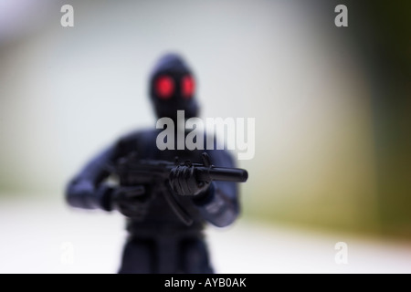 Toy Police figure made of plastic Close up Stock Photo