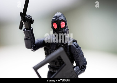 Toy Police figure made of plastic Close up Stock Photo