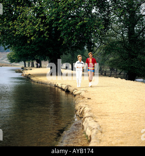Young Couple Jogging Stock Photo
