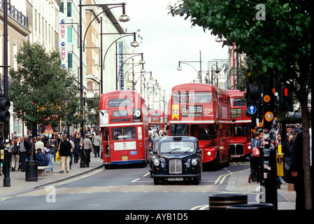 Busy Oxford Street in London with Buses and taxis. Stock Photo