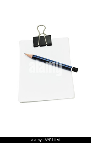 crocodile clip holding stack of loose memo papers with pencil Stock Photo