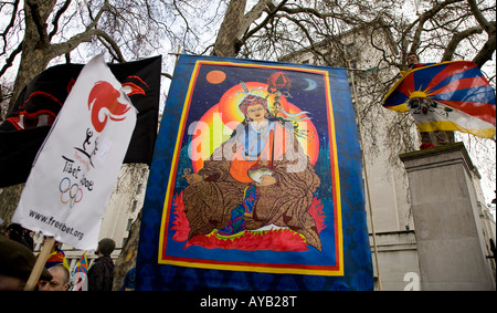 Man Standing On Podium Wearing Tibetan Flag  At The Free Tibet Demo Against The Chinese Olympics London U.K. Europe Stock Photo