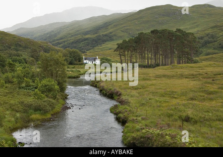 White Cottage Beside River near Loch Eilt in the Highlands of Scotland Stock Photo