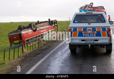 School bus in ditch Stock Photo