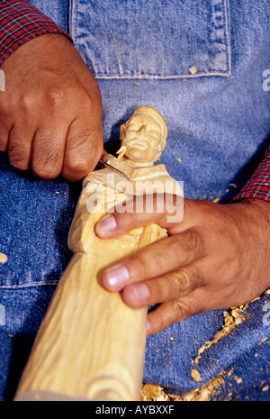 MR 656 Miguel Perez creates his hand-carved art at el Rancho de las Golondrinas, a living history museum near Santa Fe, NM. Stock Photo