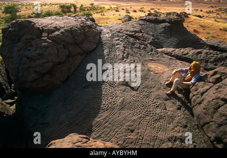 Niger, Tenere Desert. Rock Art of Giraffes in Dabos, near Ifrouane. The engravings, include a beautiful group of giraffes. Stock Photo