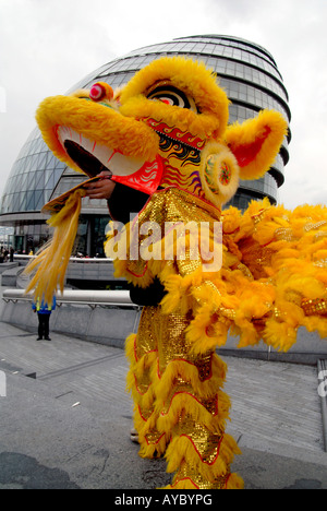 UK. CHINESE DRAGON OUTSIDE GLA HQ DURING RELAY OF OLYMPIC TORCH EN ROUTE TO BEIJING Photo © Julio Etchart Stock Photo