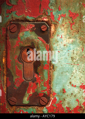 Old lock in the entrance door Stock Photo