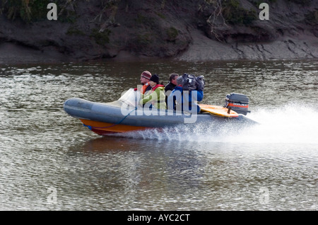 Japanese film crew filming the Severn Bore near Gloucester. Stock Photo