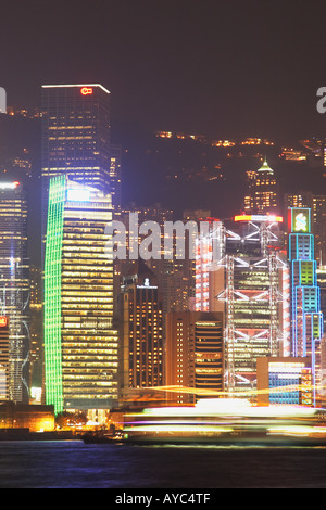 Ferry Passing In Front Of HSBC Building, Hong Kong Stock Photo