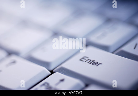 Laptop computer keyboard detail with ENTER key in focus Stock Photo