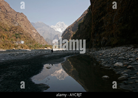 mountains mirror in the Kali Gandaki river near Tatopani Nepal Stock Photo