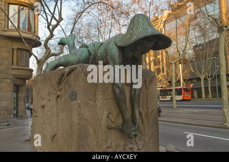 Sculpture of a boy wit a frog at Avinguda Diagonal in Barcelona on a February morning Stock Photo