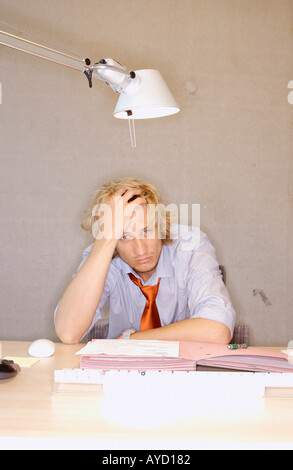 Stressed office worker Stock Photo