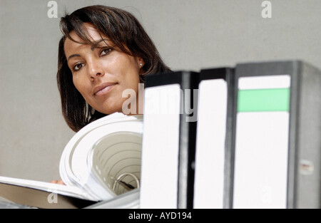 Businesswoman reading document Stock Photo