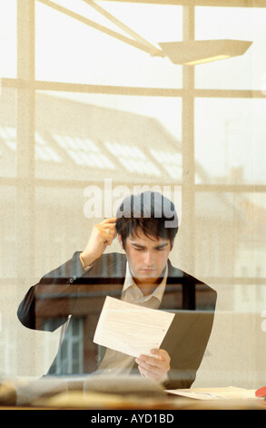 Confused looking businessman Stock Photo
