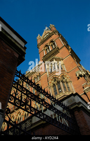 Looking up at the clock tower of the refurbished St Pancras International Railway Station Kings Cross London UK