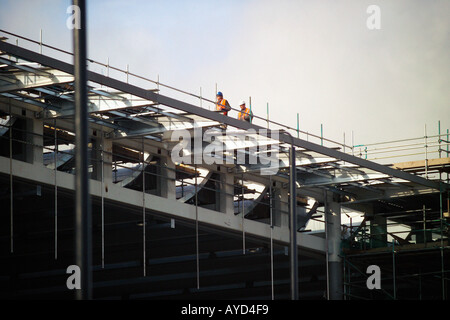 Builders on a construction site Stock Photo