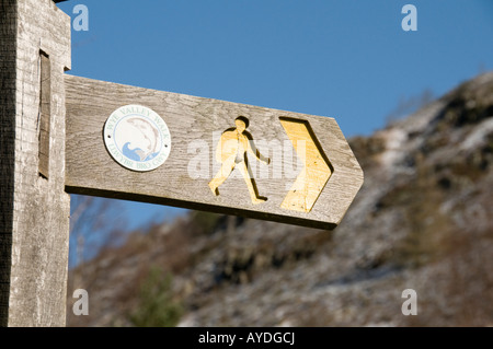 wooden signpost waymarker for the Wye Valley walk long distance footpath near Rhayder Powys Wales winter morning Stock Photo