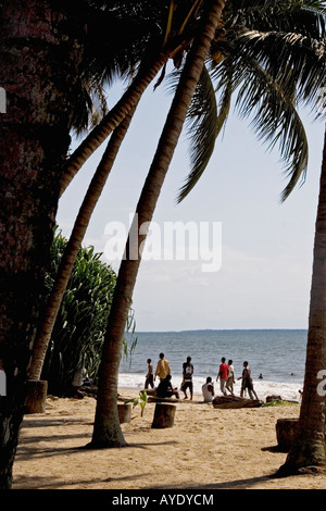 One of the main beach sites in Libreville, Gabon being enjoyed by the local people for socialising, swimming, sport and relaxing Stock Photo