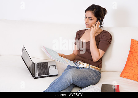 A woman sorting out her finances Stock Photo