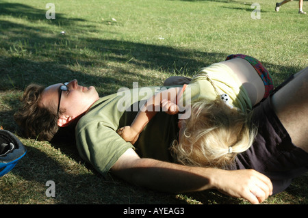 Hackney London Fields Father and daughter resting in park Stock Photo