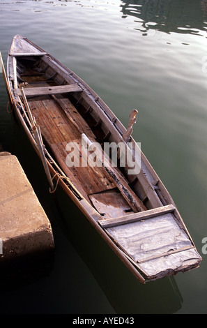 old traditional fishing rowing boat at burano oars wood wooden
