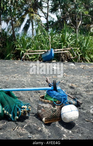 Fisherman's nets and proa on beach, Lombok indonesia Stock Photo