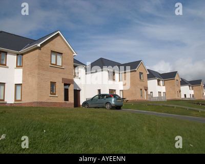 new built identical designed detached executive homes on private housing estate Aberystwyth Wales UK Stock Photo