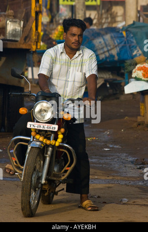 Indian Man on a Motorcycle in Thanjavur South India Stock Photo