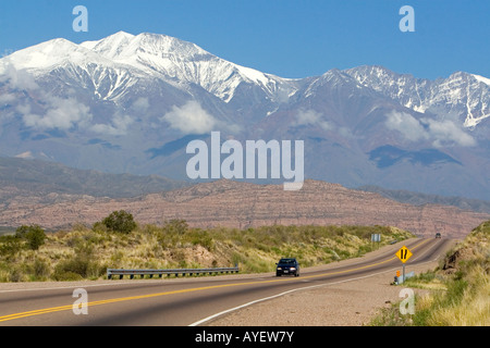 A view of the Andes Mountain Range with traffic on highway 7 near Mendoza Argentina Stock Photo
