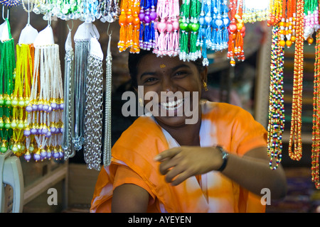Young Woman Souvenir Jewelry Vendor in Kanyakumari South Inda Stock Photo