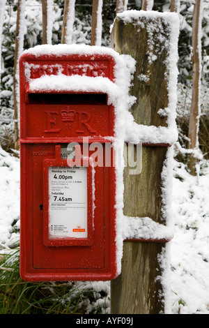 Royal Mail red letter box covered in snow Stock Photo