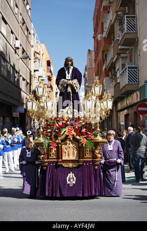 The religious procession of Christian Brotherhoods during Semana Santa (Easter Holy Week) in Valencia, Spain. Stock Photo