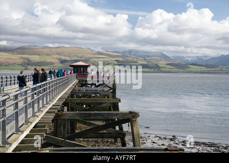 Beaumaris pier, Anglesey looking towards mountains of Snowdonia in mainland north Wales, United Kingdom Stock Photo