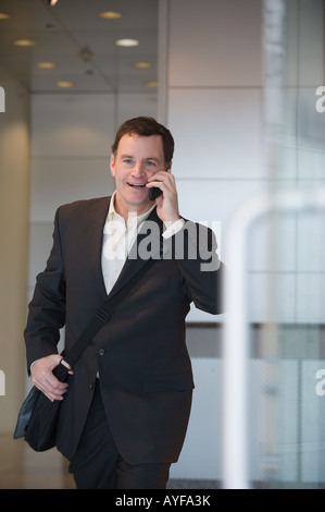 Businessman talking on cell phone Stock Photo
