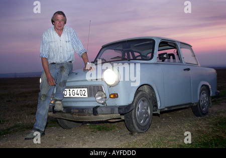 Gordon Lamont stands next to his beloved Trabant UK Stock Photo