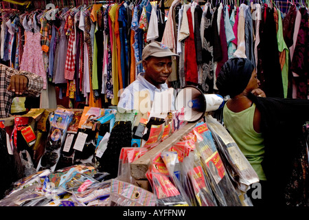 Stallholder selling clothes and accessories, Mont-Bouet Market, largest market in Libreville, Gabon Stock Photo