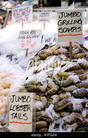 Seattle Washington State USA Shell fish prawns scallops and signs at Pike Place market Seattle Stock Photo