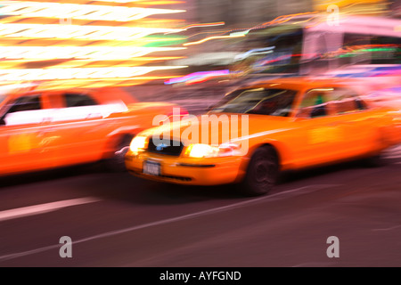 Taxi Cab in Times Square, New York City Stock Photo